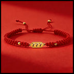 777 angel number red string bracelet alignment spiritual luck sacred cord — on-wrist lifestyle | BuddhaManifest™