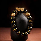 Black obsidian Pixiu Six True Words mantra wealth protection bracelet — bead & charm detail | BuddhaManifest™