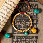 Tibetan Vajra brass red string bracelet prosperity protection handcrafted — flatlay front view | BuddhaManifest™