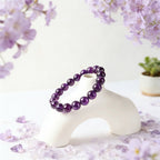 Amethyst healing crystal bracelet calm clarity purple stone jewelry — on-wrist lifestyle | BuddhaManifest™