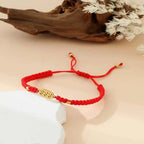 333 angel number red string bracelet support growth intention cord — stack styling shot | BuddhaManifest™