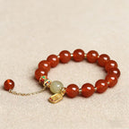 Red agate nephrite jade vitality protection stretch intention bracelet — stack styling shot | BuddhaManifest™