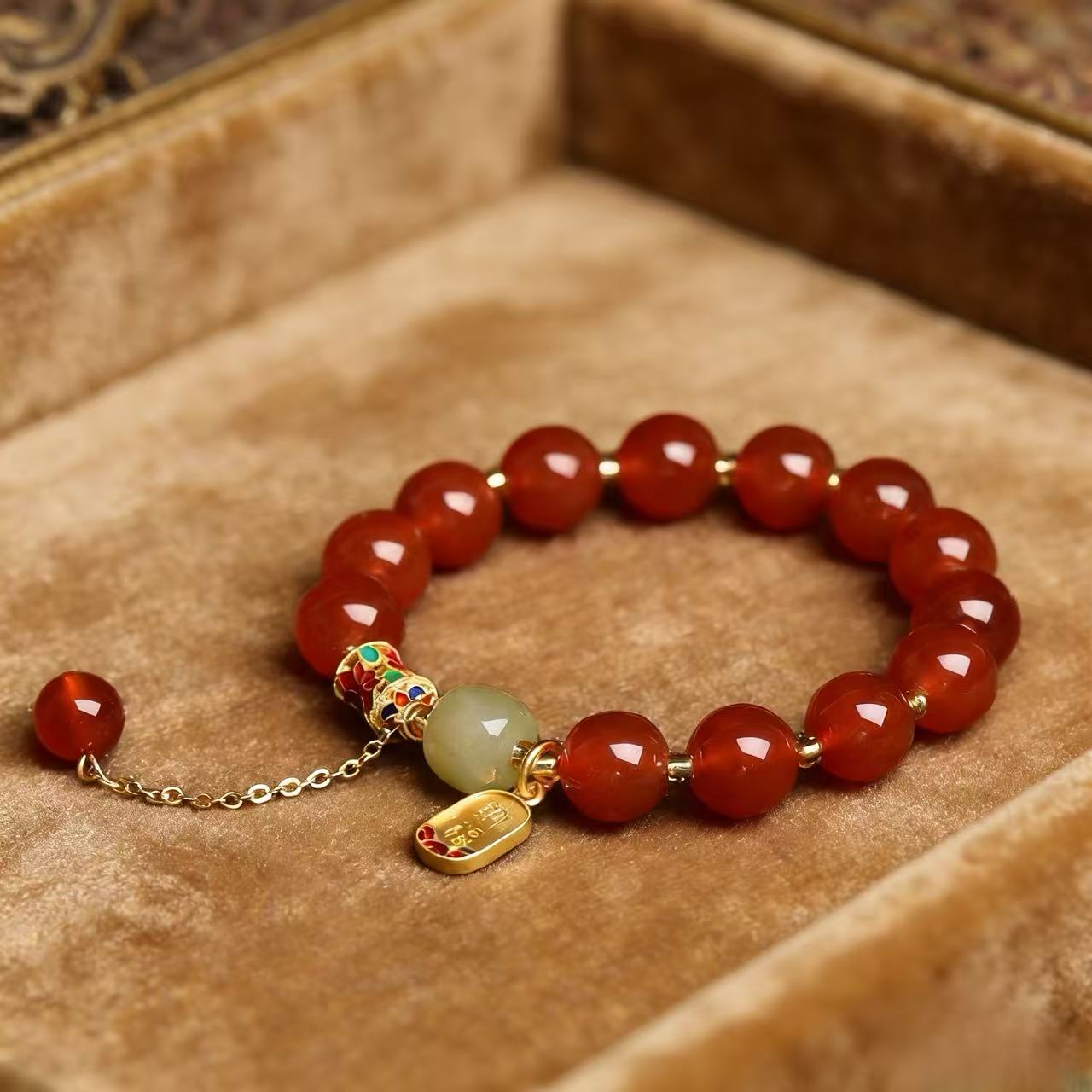 Red agate nephrite jade vitality protection stretch intention bracelet — macro stone texture | BuddhaManifest™