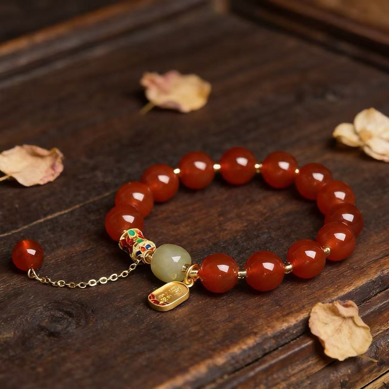 Red agate nephrite jade vitality protection stretch intention bracelet — flatlay front view | BuddhaManifest™