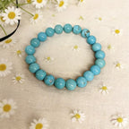 Natural turquoise protection bracelet sky stone calm spiritual jewelry — side angle product | BuddhaManifest™