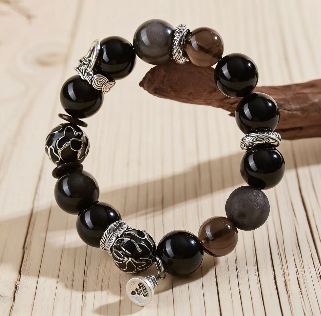 Obsidian thunder-struck wood protection bracelet grounding talisman jewelry — side angle product | BuddhaManifest™
