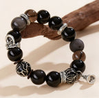 Obsidian thunder-struck wood protection bracelet grounding talisman jewelry — on-wrist lifestyle | BuddhaManifest™