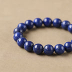 Royal lapis lazuli wisdom bracelet healing crystal deep blue jewelry — side angle product | BuddhaManifest™