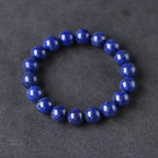 Royal lapis lazuli wisdom bracelet healing crystal deep blue jewelry — macro stone texture | BuddhaManifest™