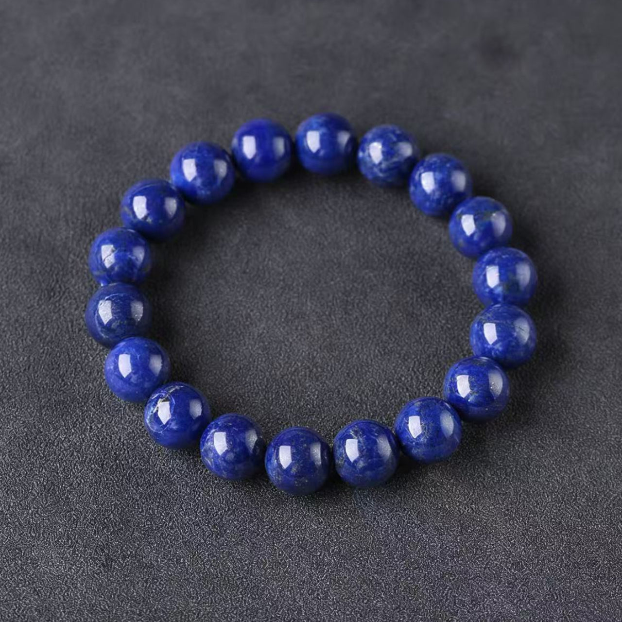 Royal lapis lazuli wisdom bracelet healing crystal deep blue jewelry — macro stone texture | BuddhaManifest™