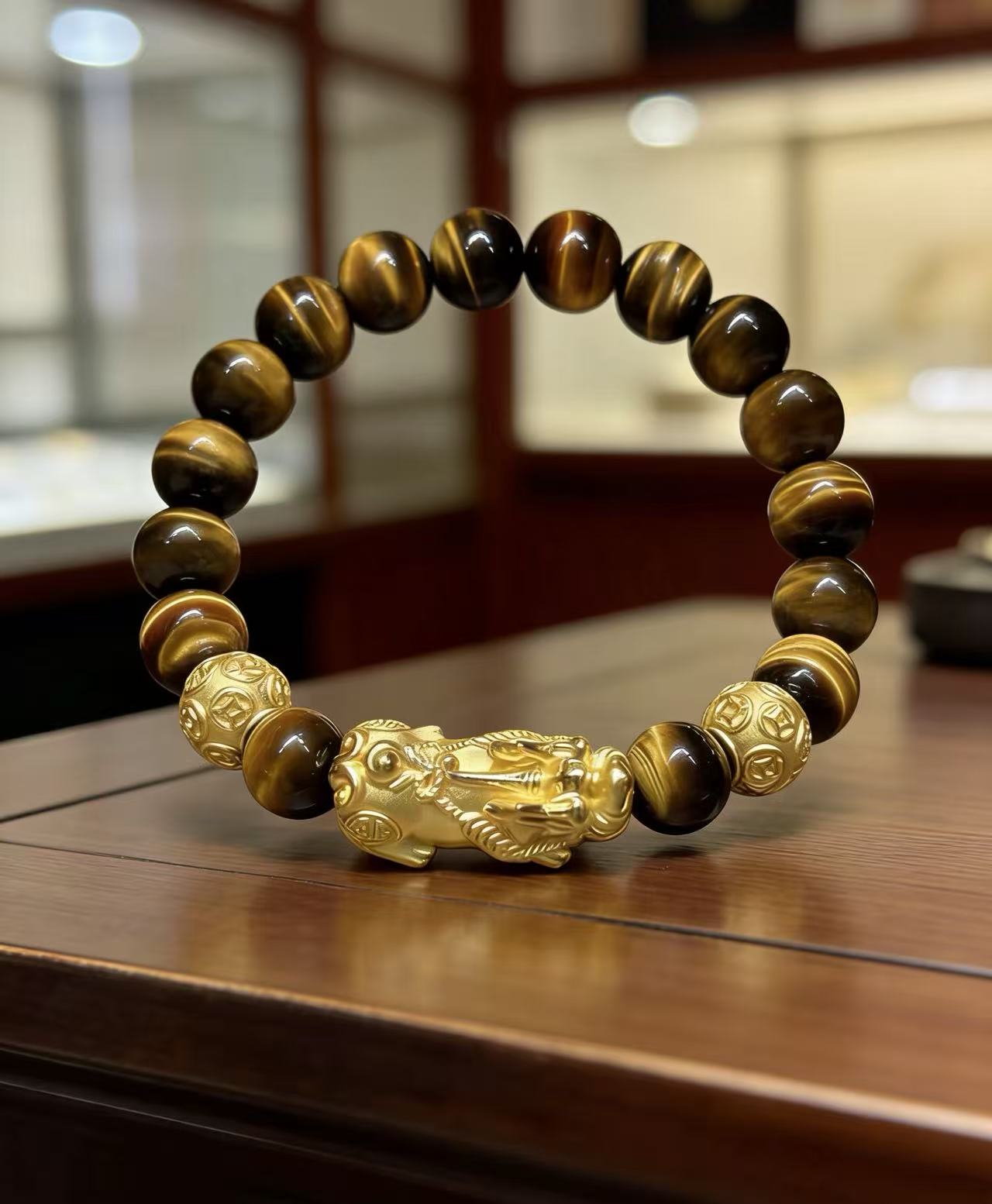 Golden tiger eye Pixiu wealth bracelet Feng Shui abundance courage jewelry — macro stone texture | BuddhaManifest™