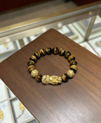 Golden tiger eye Pixiu wealth bracelet Feng Shui abundance courage jewelry — close-up hardware | BuddhaManifest™