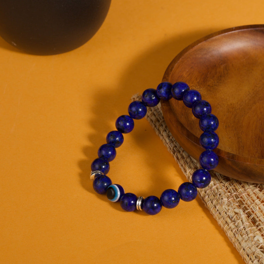 Lapis lazuli evil eye bracelet intuition truth protection stone jewelry — flatlay front view | BuddhaManifest™