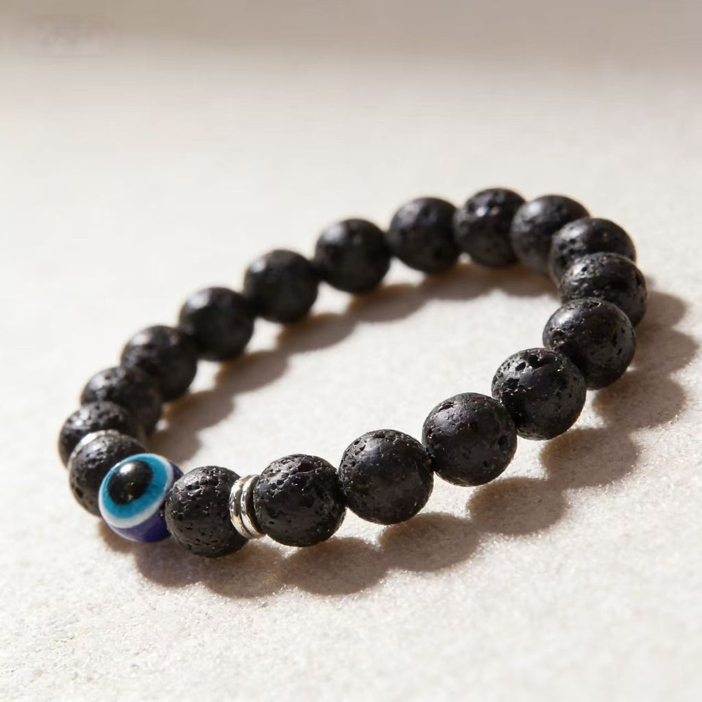 Frosted stone evil eye matte bracelet protection talisman jewelry — macro stone texture | BuddhaManifest™