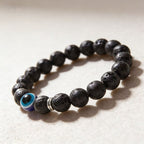 Frosted stone evil eye matte bracelet protection talisman jewelry — macro stone texture | BuddhaManifest™