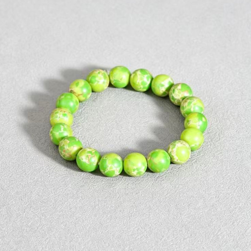 Imperial banded stone bracelet vitality noble energy spiritual stack — macro stone texture | BuddhaManifest™