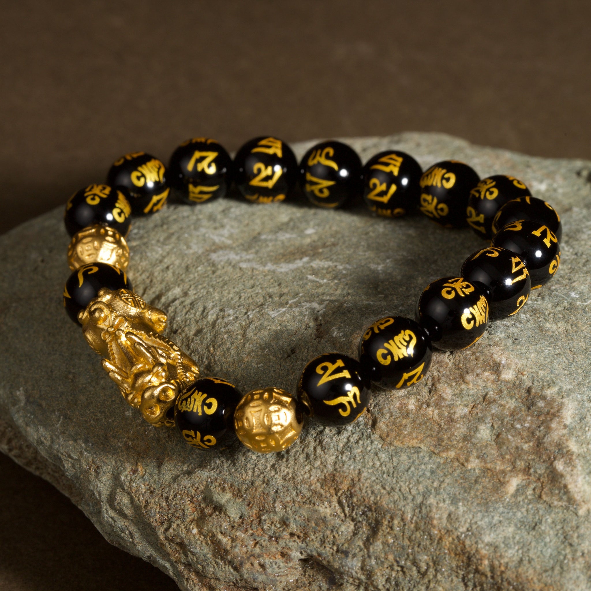 Black obsidian Pixiu Six True Words mantra wealth protection bracelet — on-wrist lifestyle | BuddhaManifest™