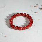 Natural red agate bead bracelet courage vitality good fortune stack — macro stone texture | BuddhaManifest™