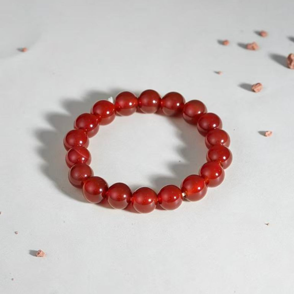 Natural red agate bead bracelet courage vitality good fortune stack — macro stone texture | BuddhaManifest™