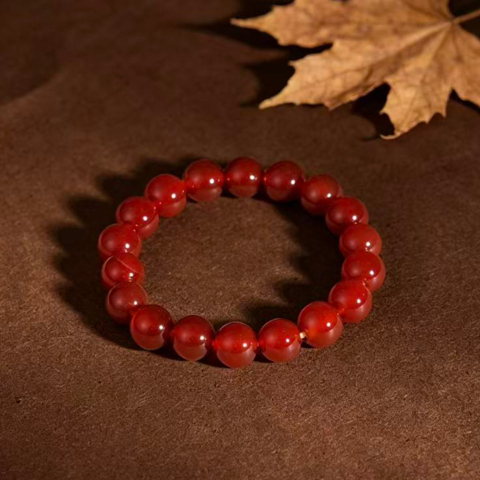 Natural red agate bead bracelet courage vitality good fortune stack — flatlay front view | BuddhaManifest™ Main image