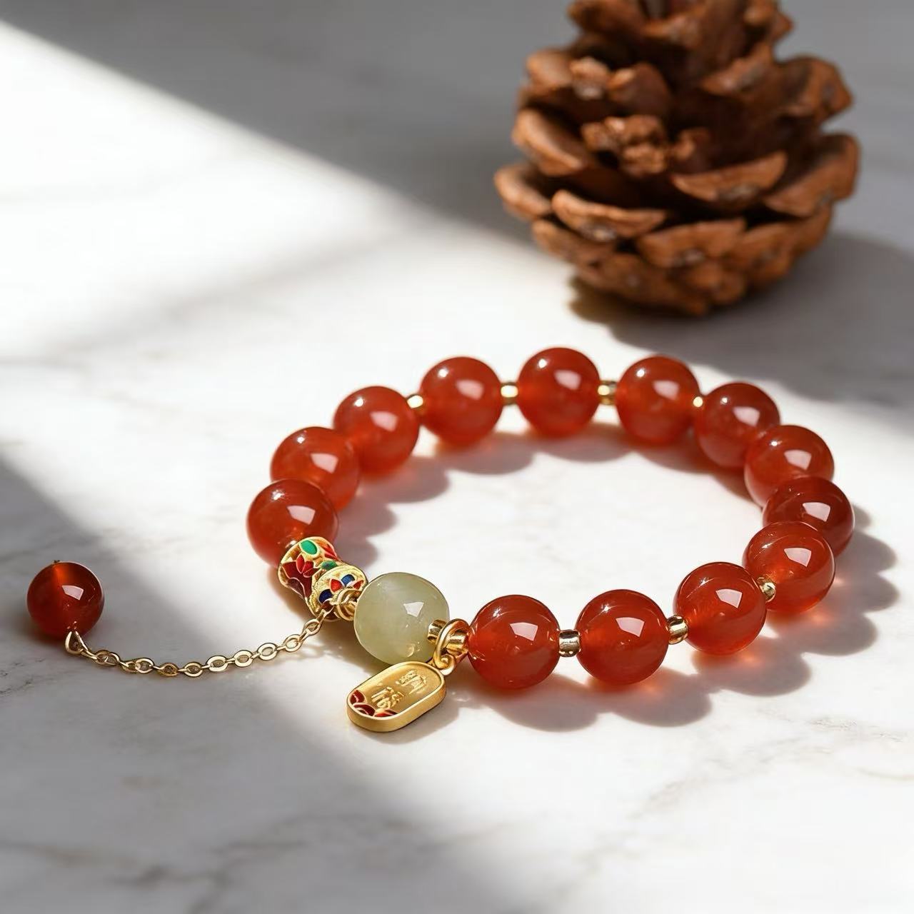 Red agate Fu charm fortune bracelet stretch intention jewelry gift — side angle product | BuddhaManifest™