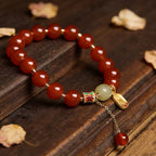Red agate nephrite jade vitality protection stretch intention bracelet — bead & charm detail | BuddhaManifest™
