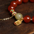Red agate Fu charm fortune bracelet stretch intention jewelry gift — bead & charm detail | BuddhaManifest™