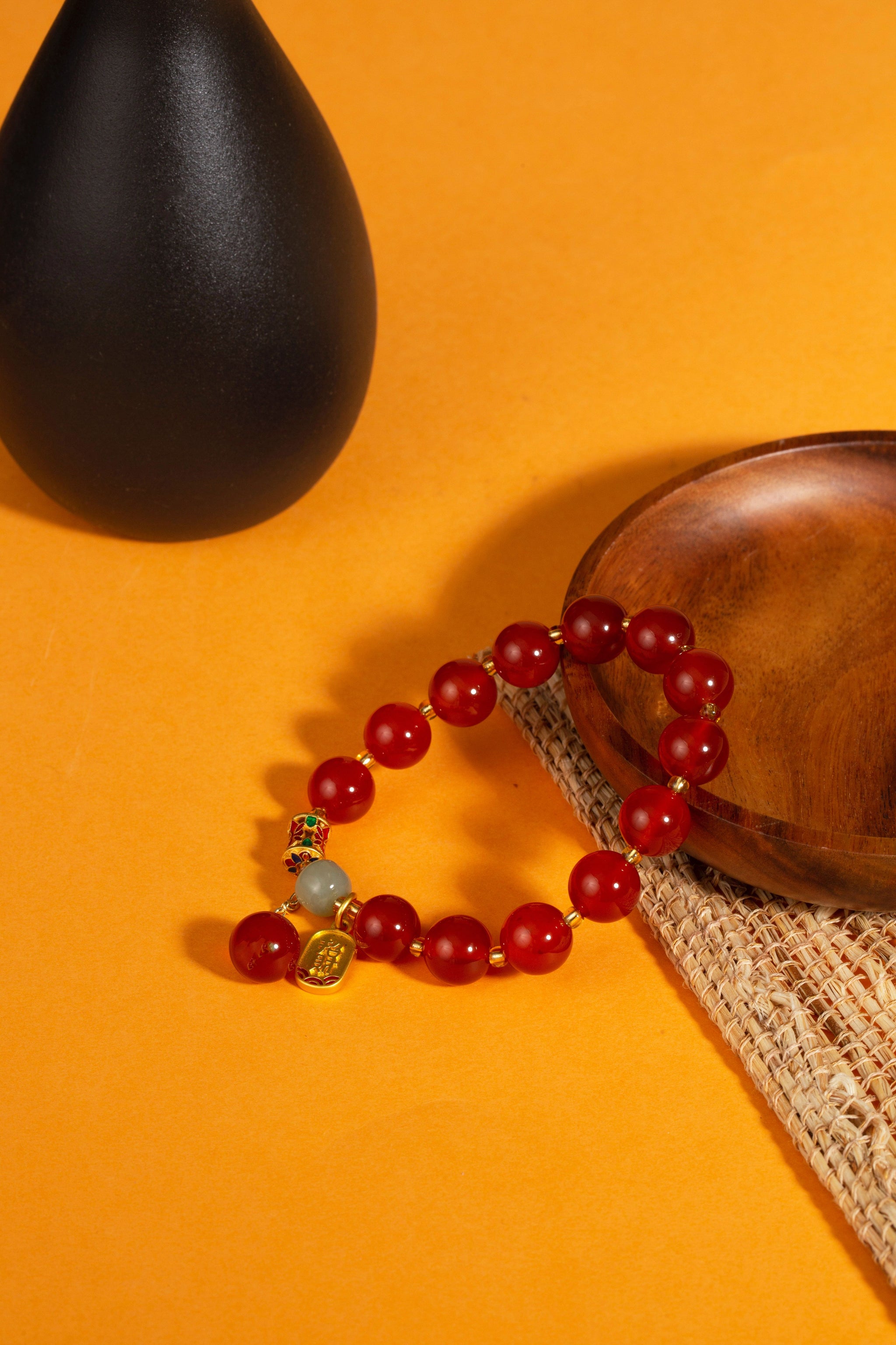 Red agate nephrite jade vitality protection stretch intention bracelet — macro stone texture | BuddhaManifest™