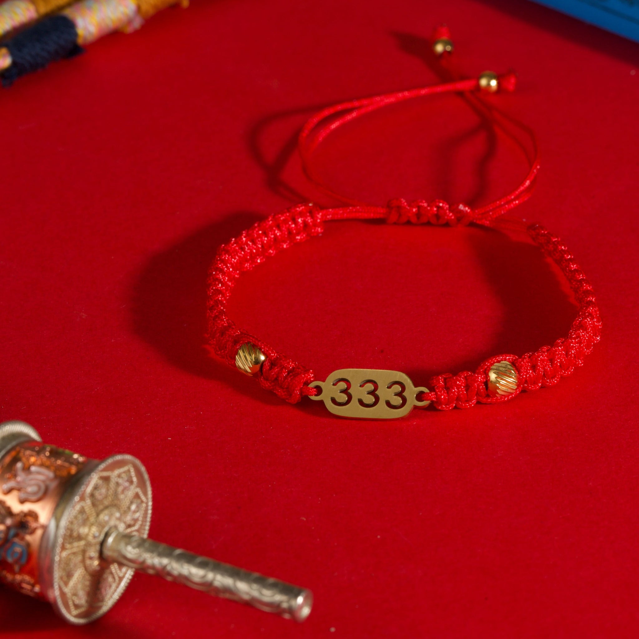 333 angel number red string bracelet support growth intention cord — on-wrist lifestyle | BuddhaManifest™