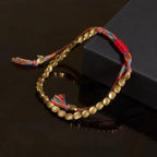 Tibetan Vajra brass red string bracelet prosperity protection handcrafted — bead & charm detail | BuddhaManifest™