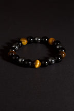Triple protection tiger eye obsidian hematite bracelet courage shield — stack styling shot | BuddhaManifest™
