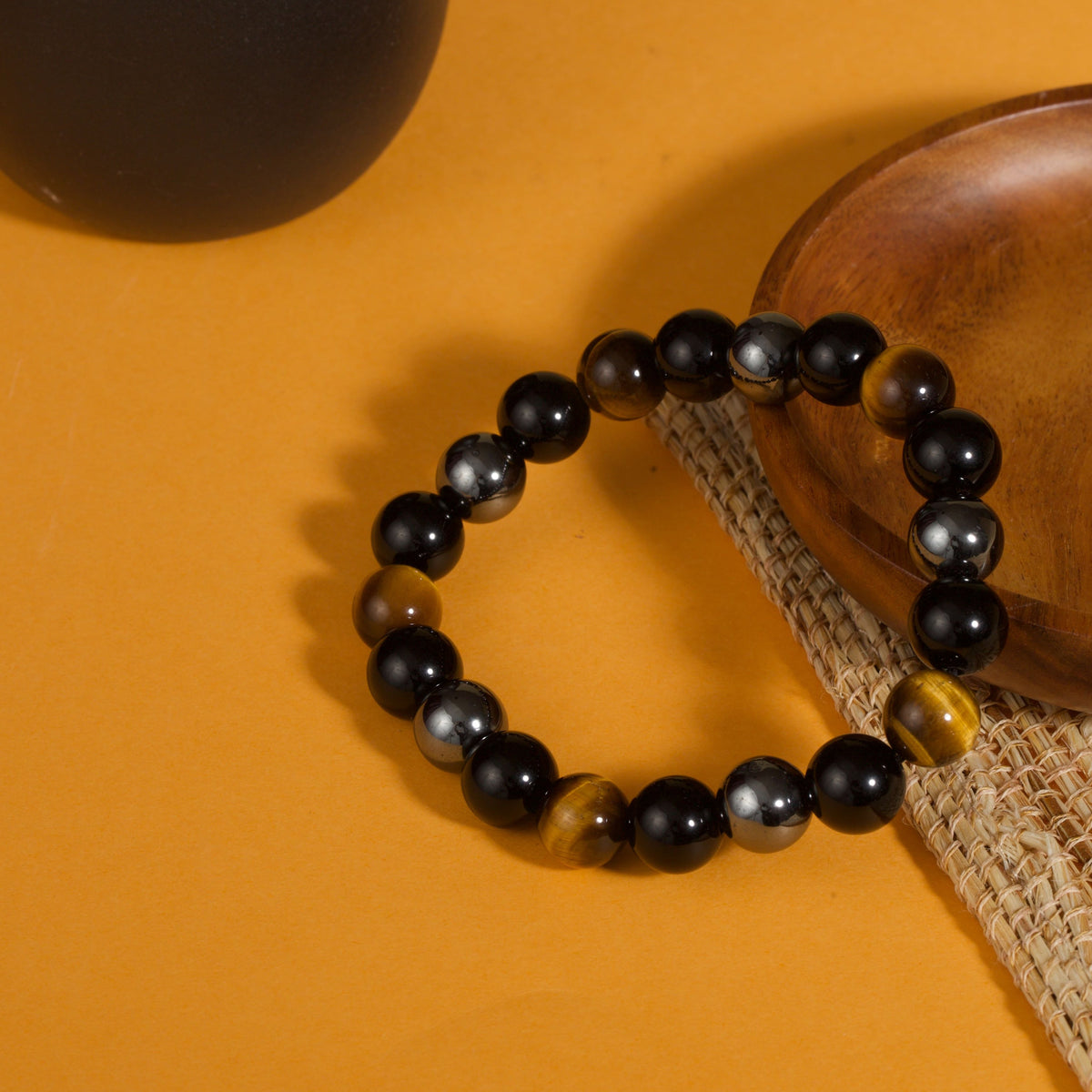 Obsidian tiger eye magnetite triple protection bracelet spiritual jewelry — flatlay front view | BuddhaManifest™ Main image