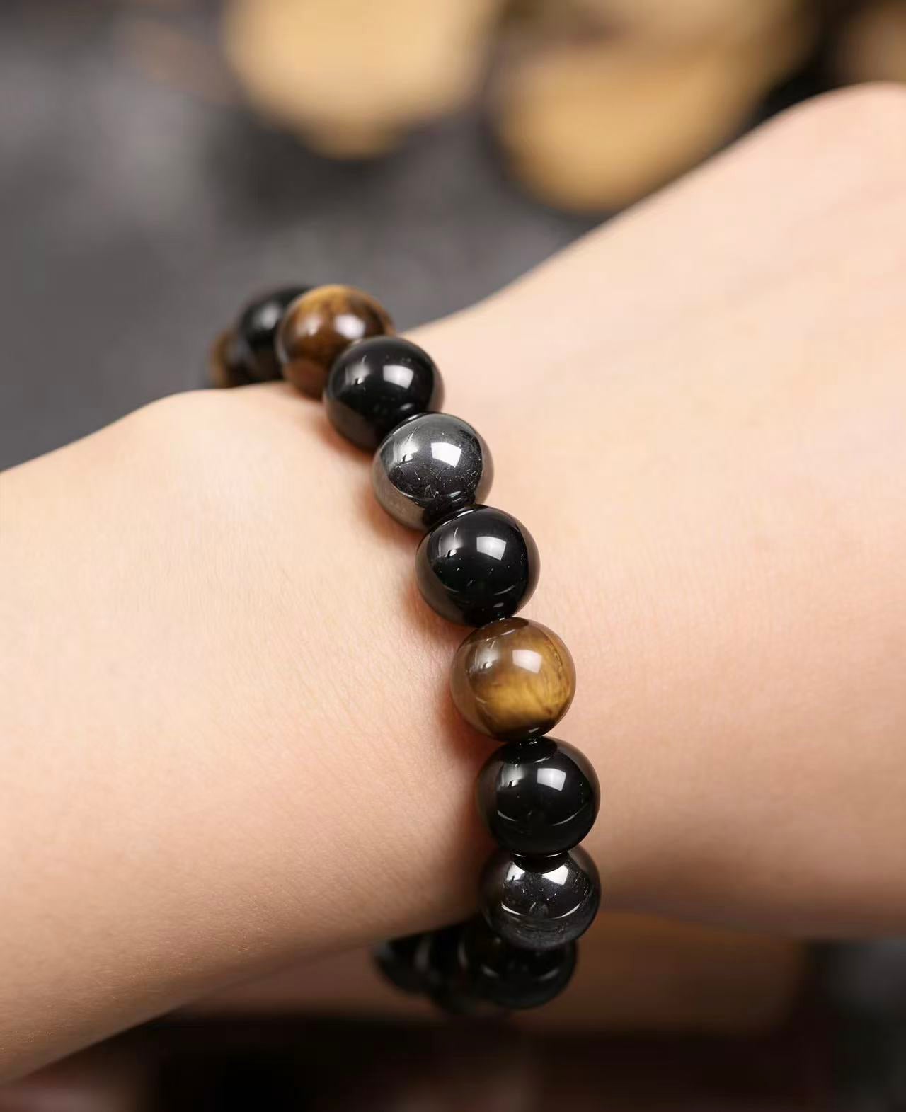 Triple protection tiger eye obsidian hematite bracelet courage shield — on-wrist lifestyle | BuddhaManifest™