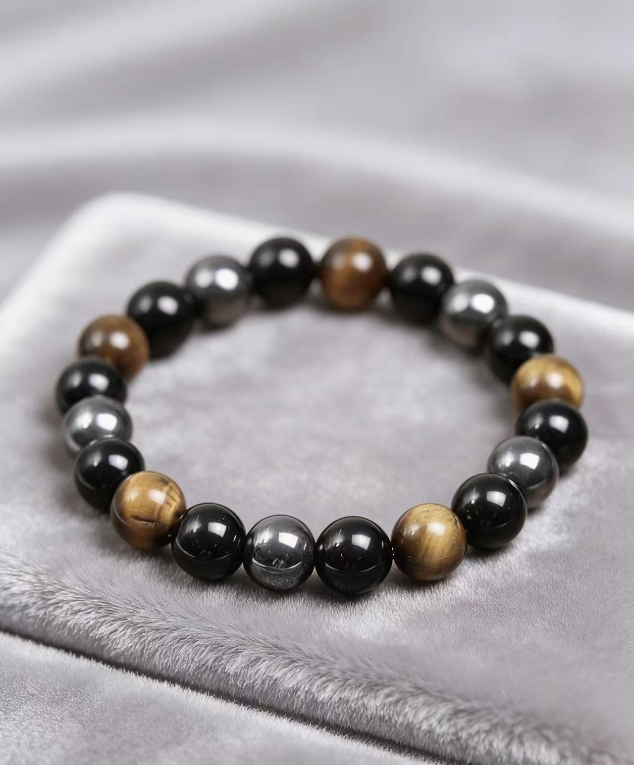 Triple protection tiger eye obsidian hematite bracelet courage shield — bead & charm detail | BuddhaManifest™