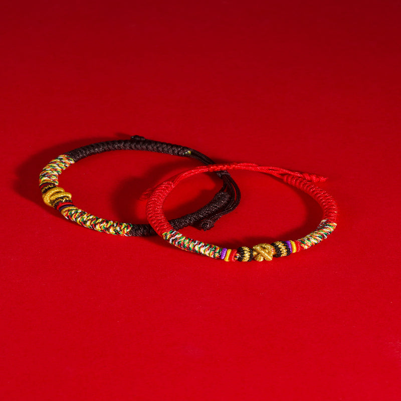 Tibetan Vajra knot red string hand-knotted protection sacred cord bracelet — flatlay front view | BuddhaManifest™ Main image