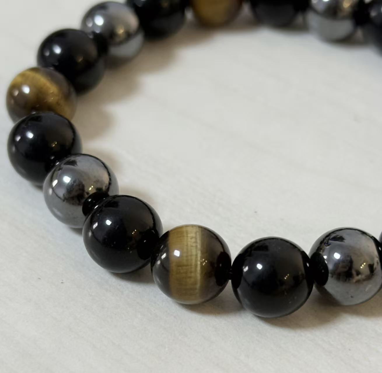 Triple protection tiger eye obsidian hematite bracelet courage shield — full bracelet coil | BuddhaManifest™